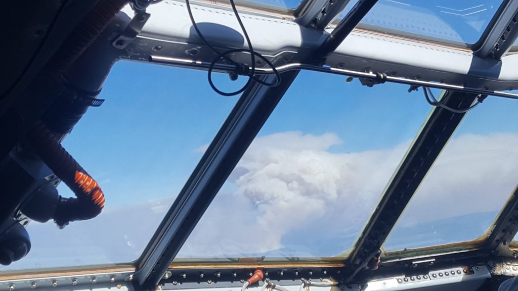 Wildfire viewed from the cockpit of the C-130 plane